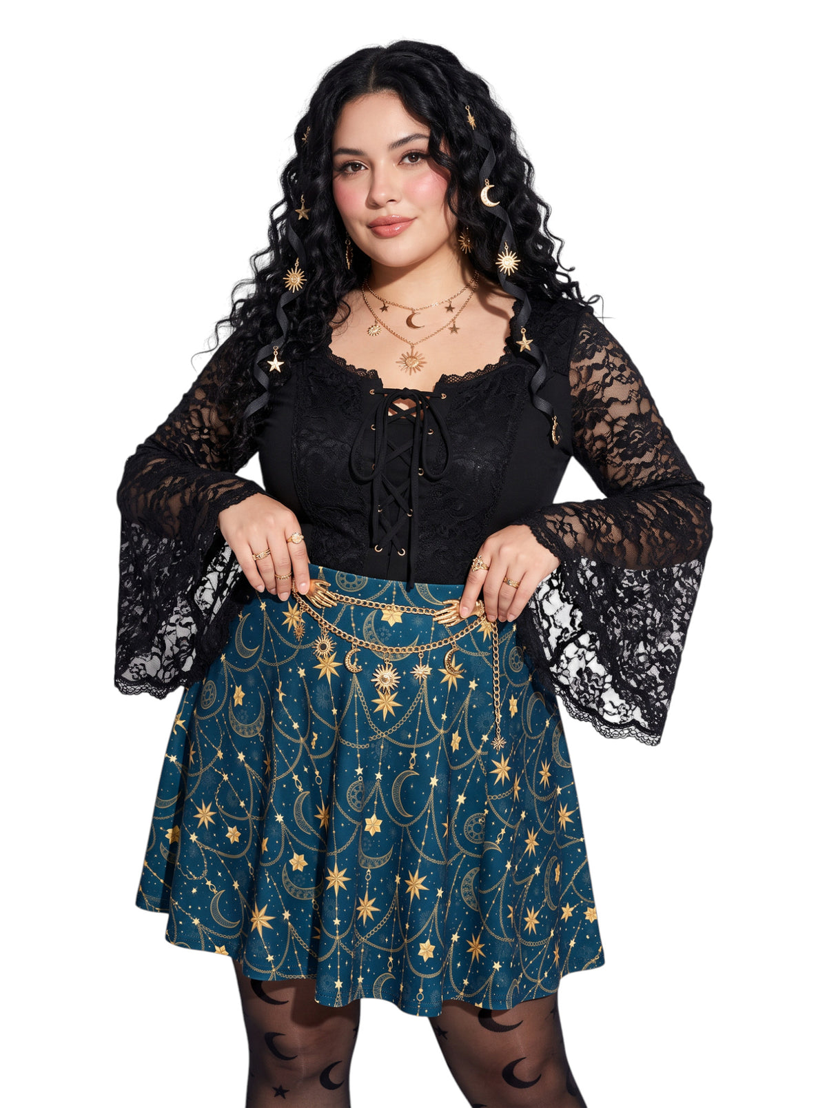 Plus-size model wearing a high-waisted whimsigoth celestial skater skirt in navy blue with a gold sun and moon pattern, featuring a soft and stretchy fit and flare silhouette.