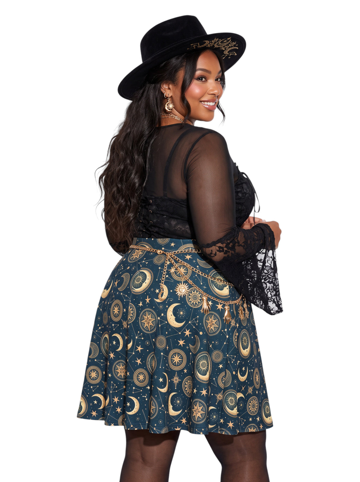 Plus size woman modeling a high-waisted whimsigoth celestial skater skirt in dark navy blue with a detailed gold sun and moon astrology pattern, styling an alternative 90s witchy outfit.
