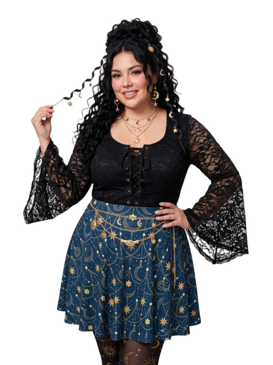 Plus-size model wearing a high-waisted whimsigoth celestial skater skirt in navy blue with a gold sun and moon pattern, featuring a soft and stretchy fit and flare silhouette.