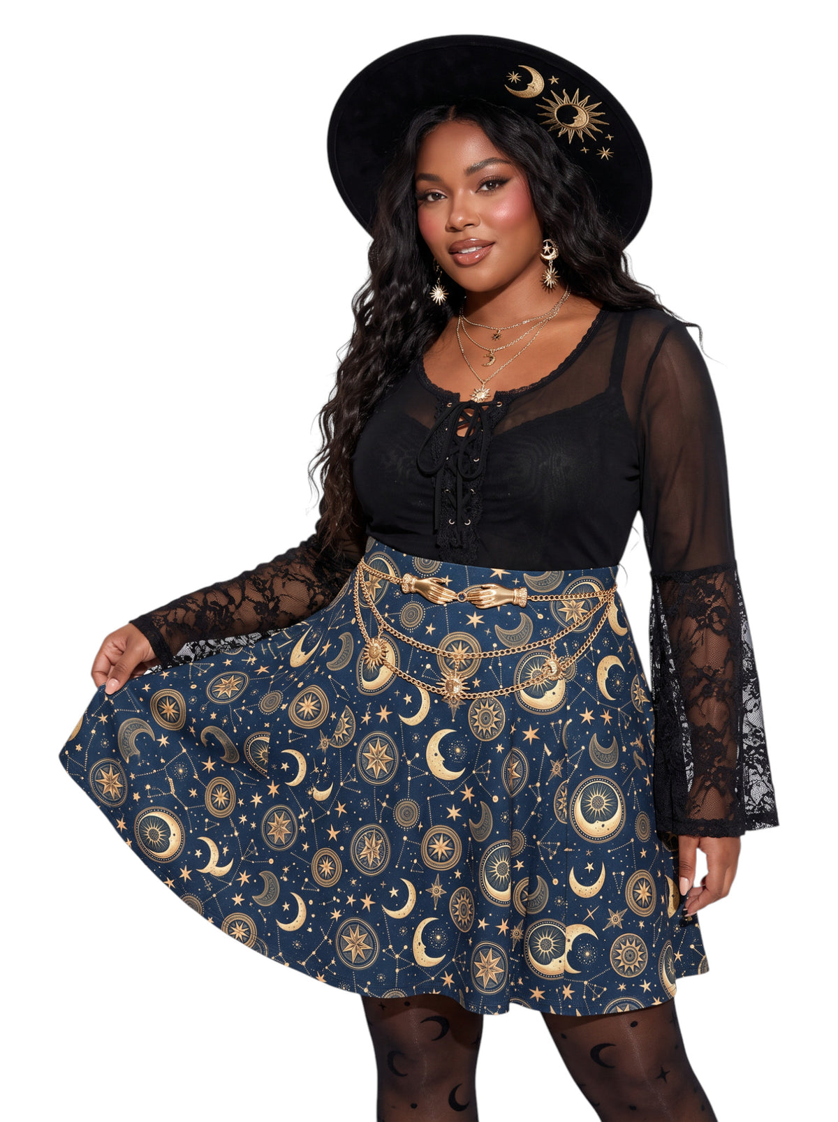 Plus size woman modeling a high-waisted whimsigoth celestial skater skirt in dark navy blue with a detailed gold sun and moon astrology pattern, styling an alternative 90s witchy outfit.