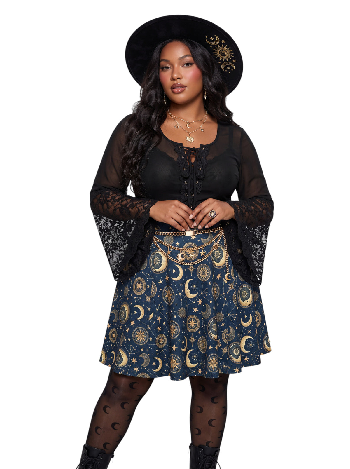 Plus size woman modeling a high-waisted whimsigoth celestial skater skirt in dark navy blue with a detailed gold sun and moon astrology pattern, styling an alternative 90s witchy outfit.