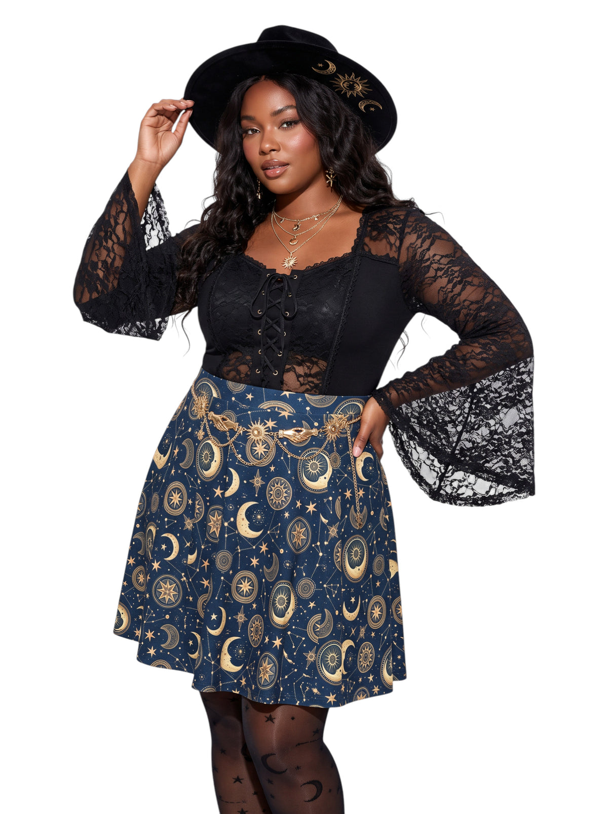 Plus size woman modeling a high-waisted whimsigoth celestial skater skirt in dark navy blue with a detailed gold sun and moon astrology pattern, styling an alternative 90s witchy outfit.