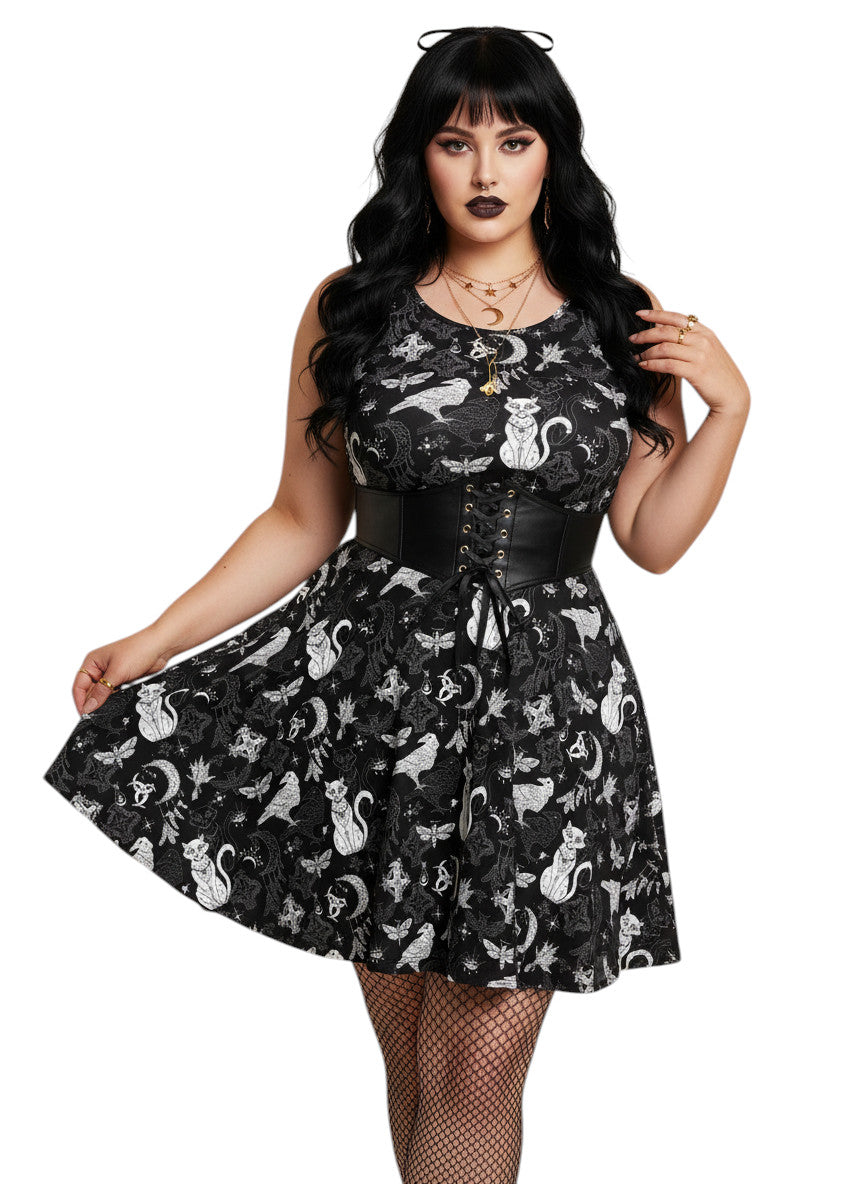 Plus size woman wearing a Whimsigoth fit and flare dress with witchy cat and celestial moon prints.