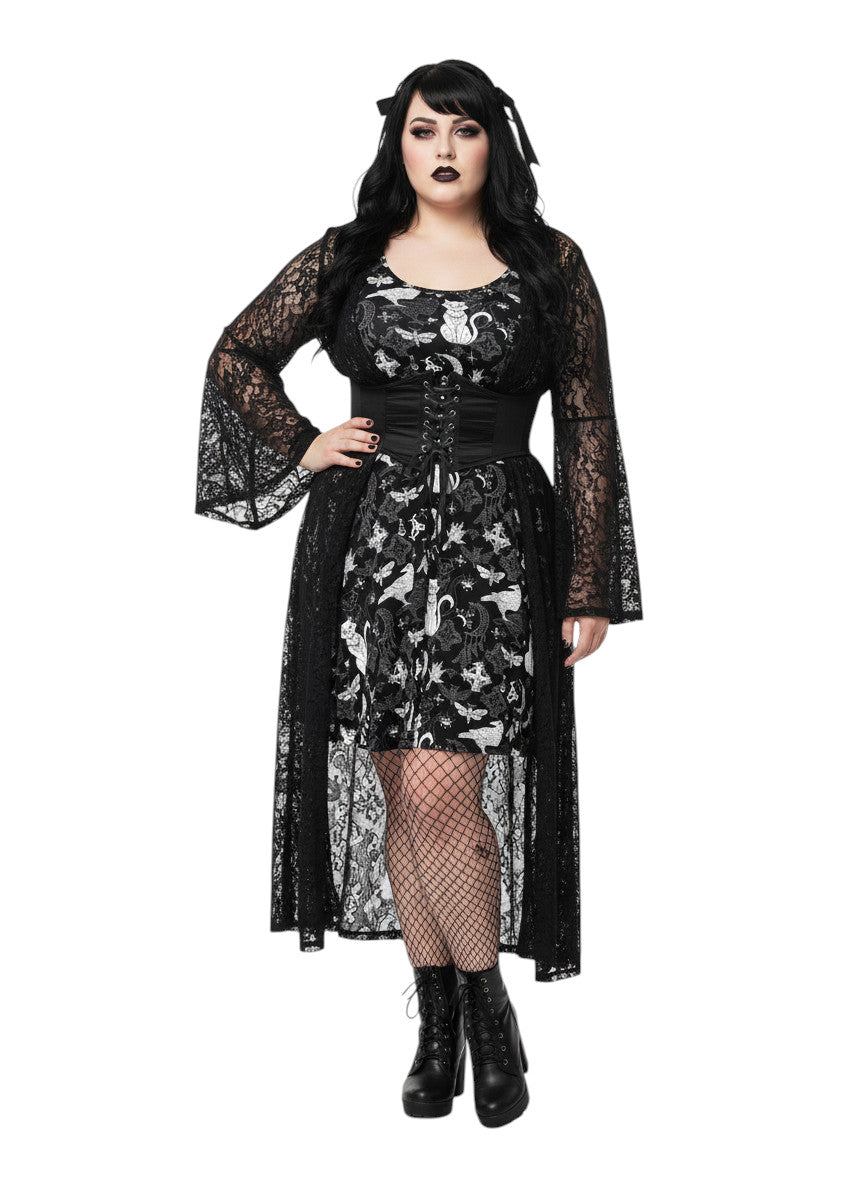 Woman wearing a Whimsigoth fit and flare dress with witchy cat and celestial moon prints.