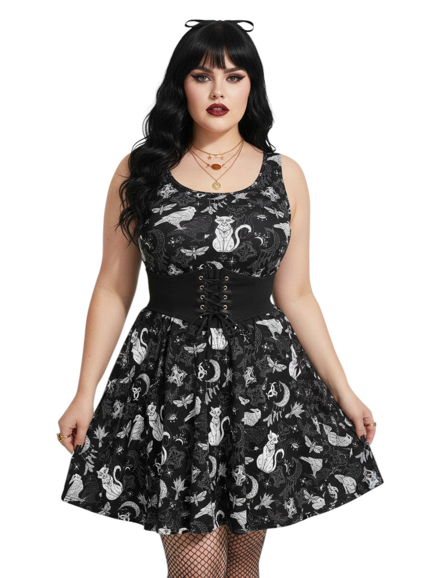 Plus size woman wearing a Whimsigoth fit and flare dress with witchy cat and celestial moon prints.