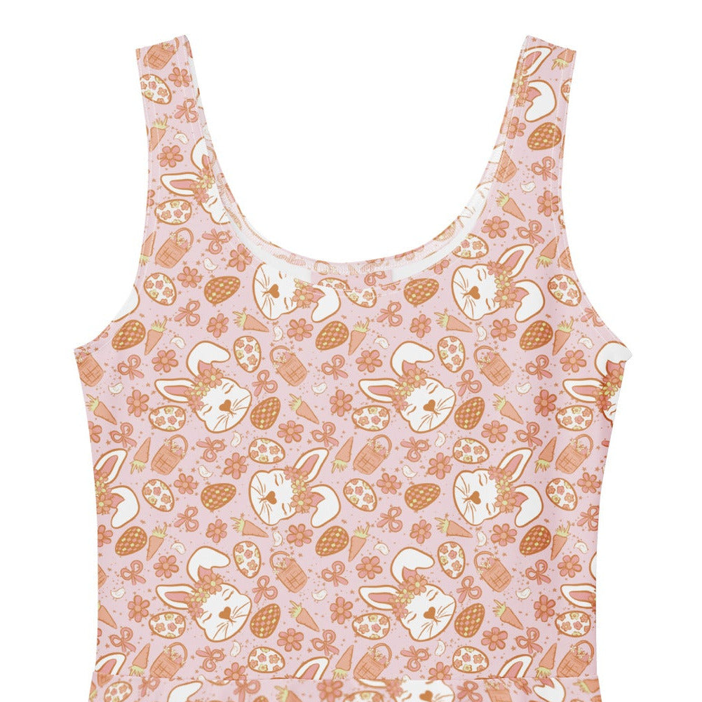 1950s style pink Easter bunny print swing dress with a fit and flare silhouette.