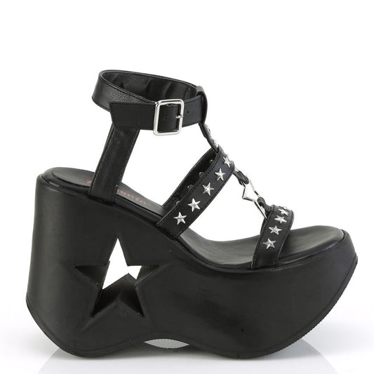 -inch black platform wedge sandal with star cutout heel and silver star studded straps.