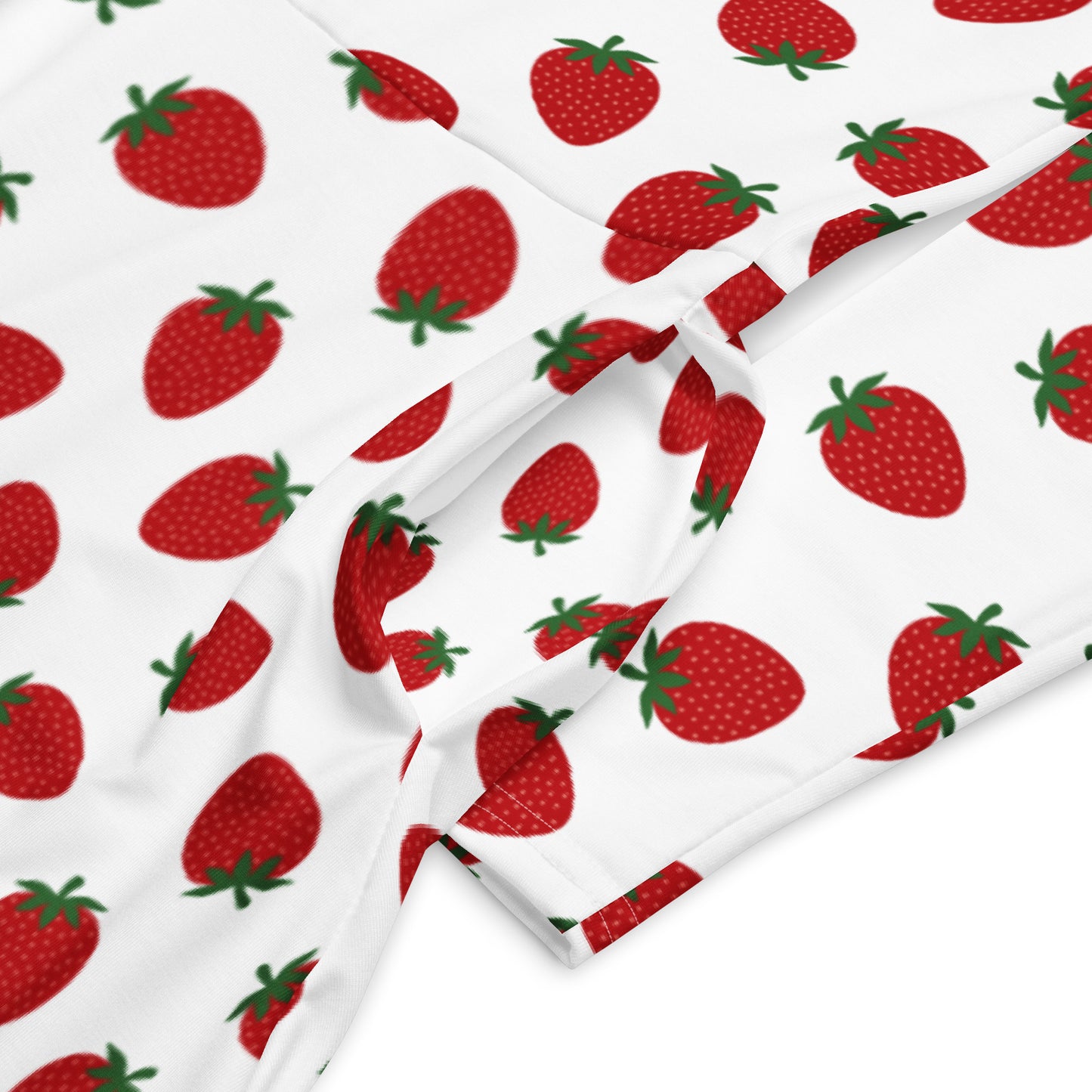 white and red strawberry print long sleeve dress on white background