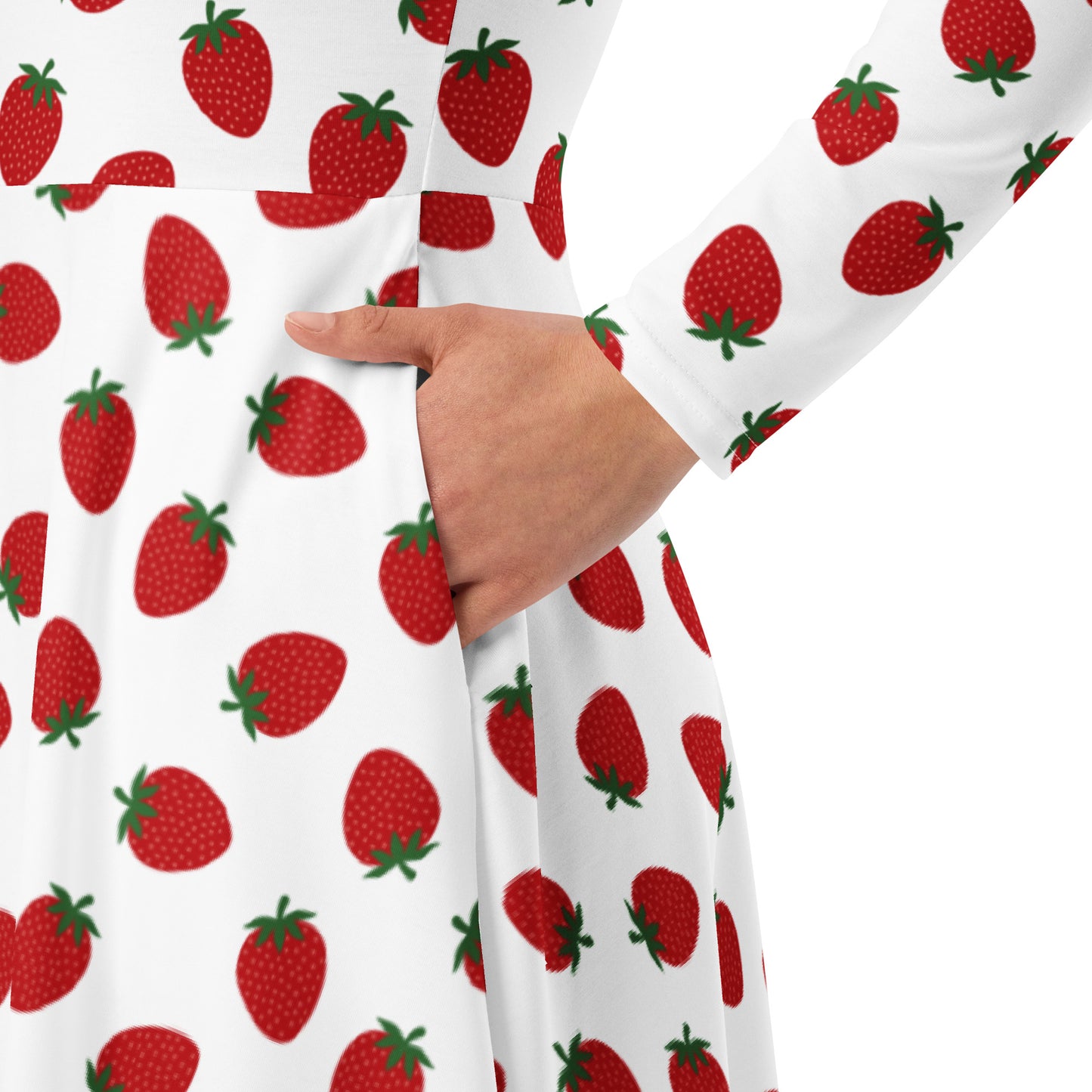 Woman wearing white and red strawberry print long sleeve dress
