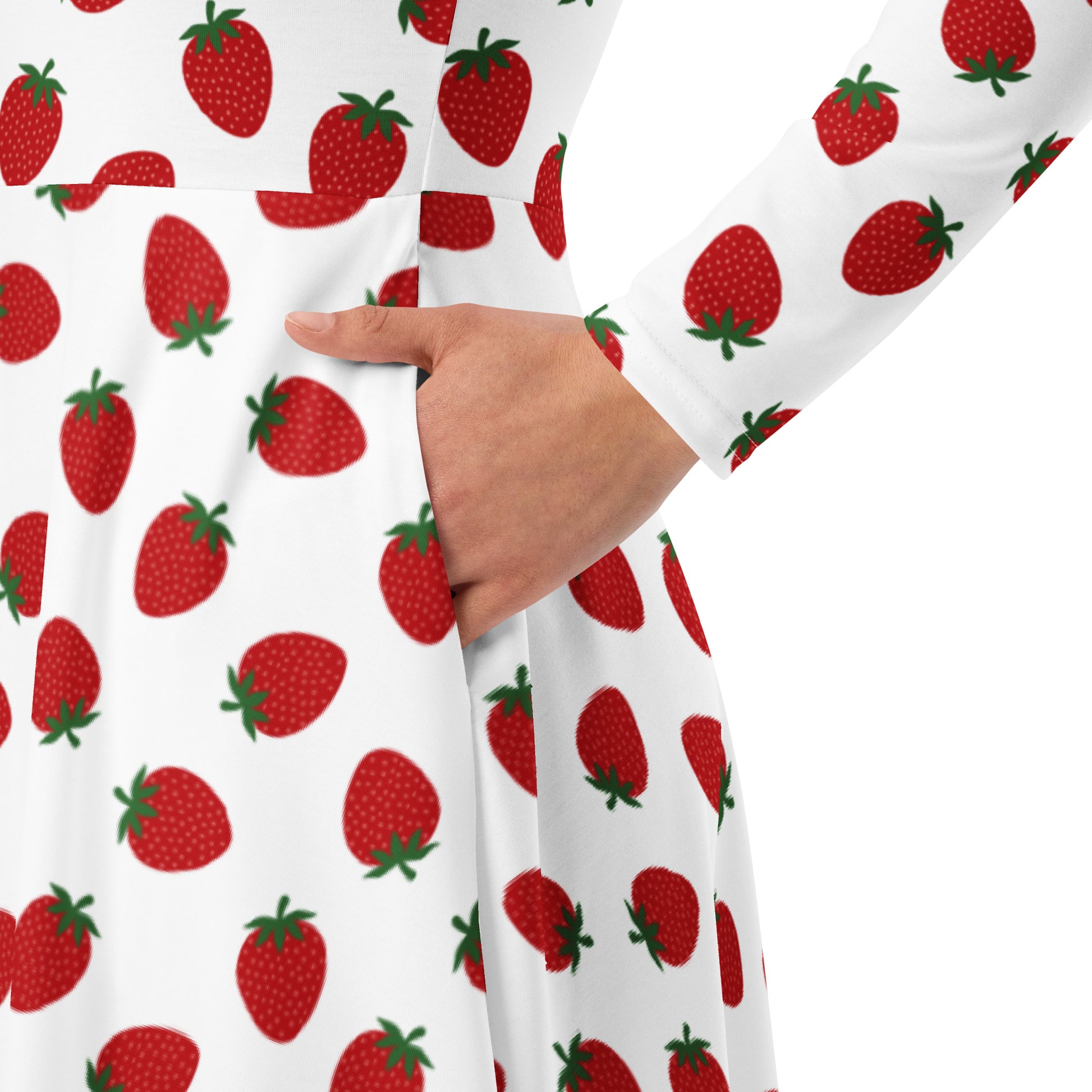 Woman wearing white and red strawberry print long sleeve dress