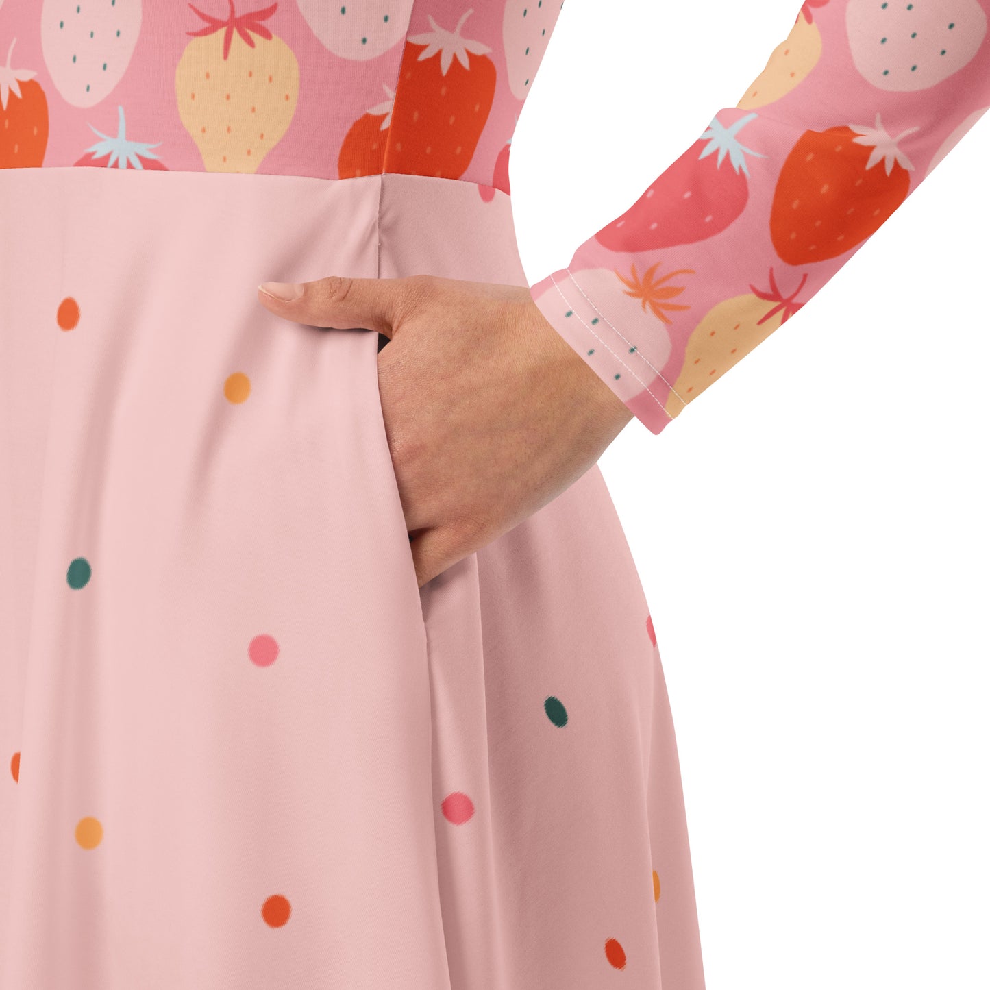 Woman wearing pink and red strawberry print long sleeve pin up dress with pockets