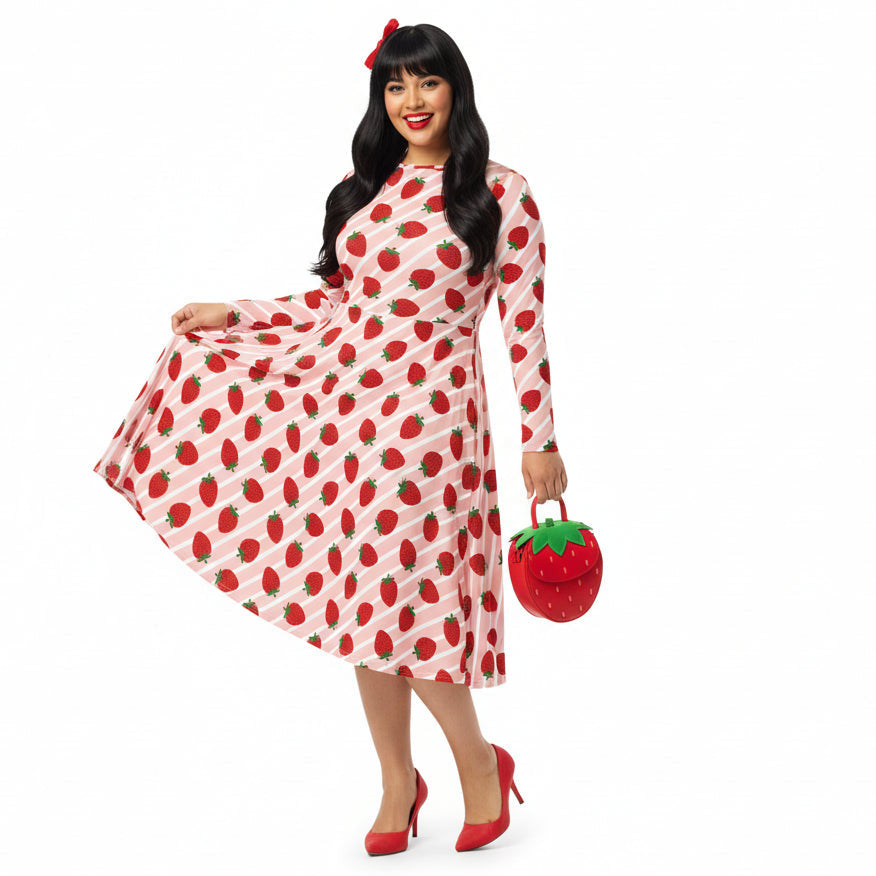 Model wearing Strawberry stripe print longsleeve dress with pockets on white background