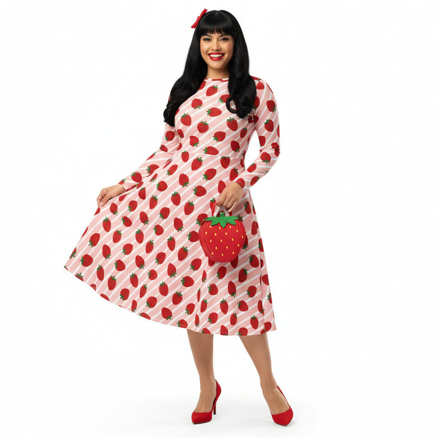 Woman wearing Strawberry print longsleeve dress with pockets on white background
