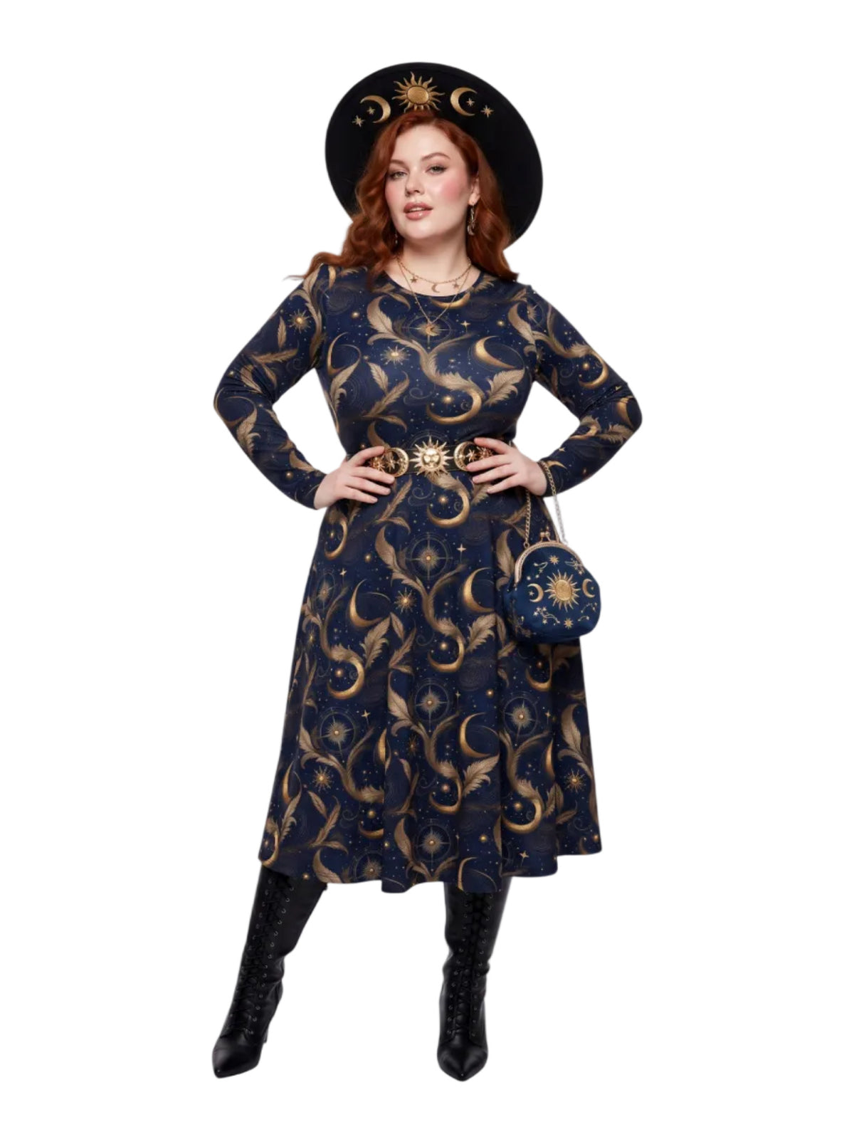 Plus size woman wearing a navy blue long sleeve fit and flare midi dress featuring a gold sun, moon, and stars celestial print with hands on hips showing the hidden pockets.