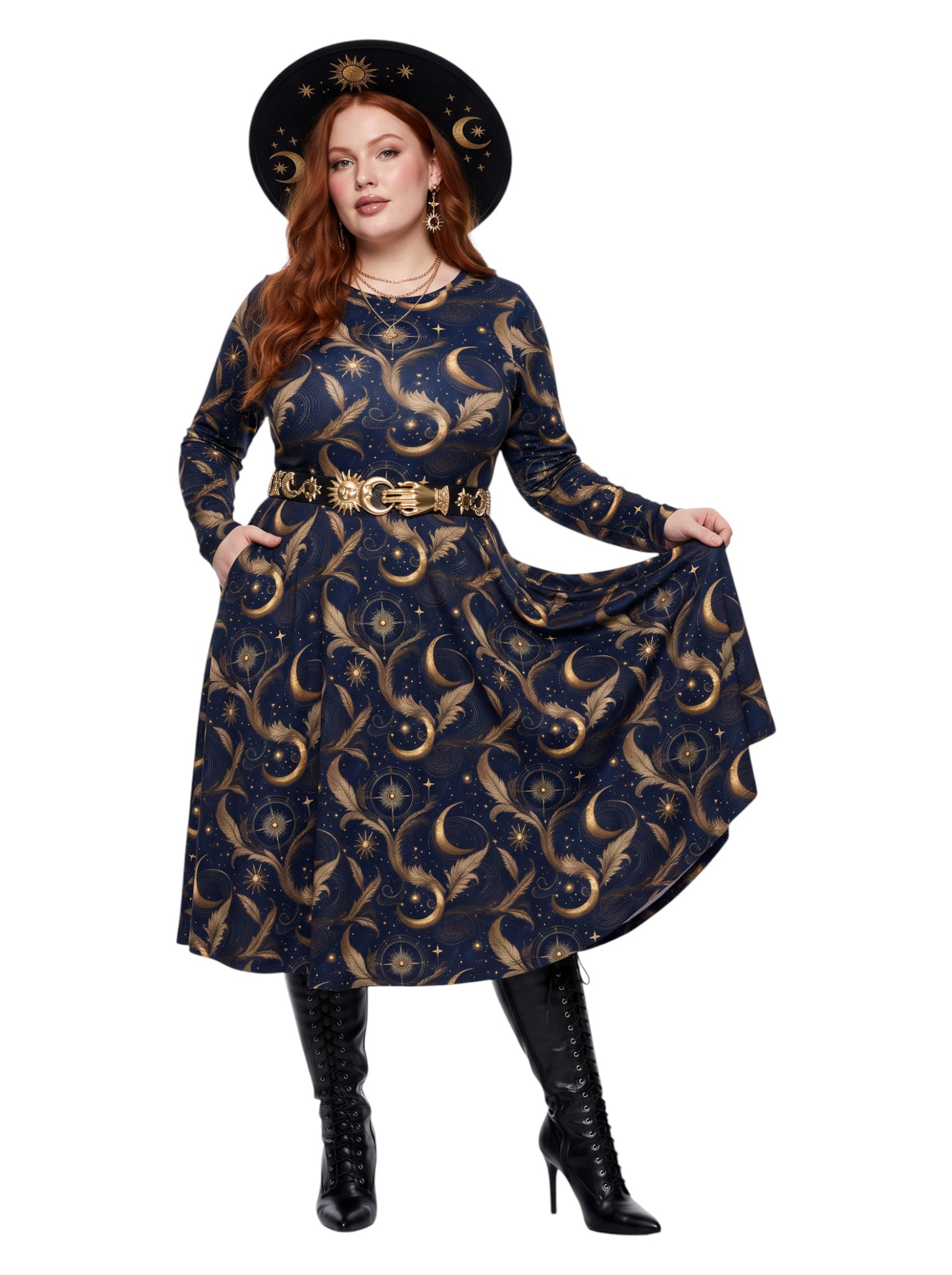 Plus size woman wearing a navy blue long sleeve fit and flare midi dress with side slit pockets featuring a gold sun, moon, and stars celestial print.