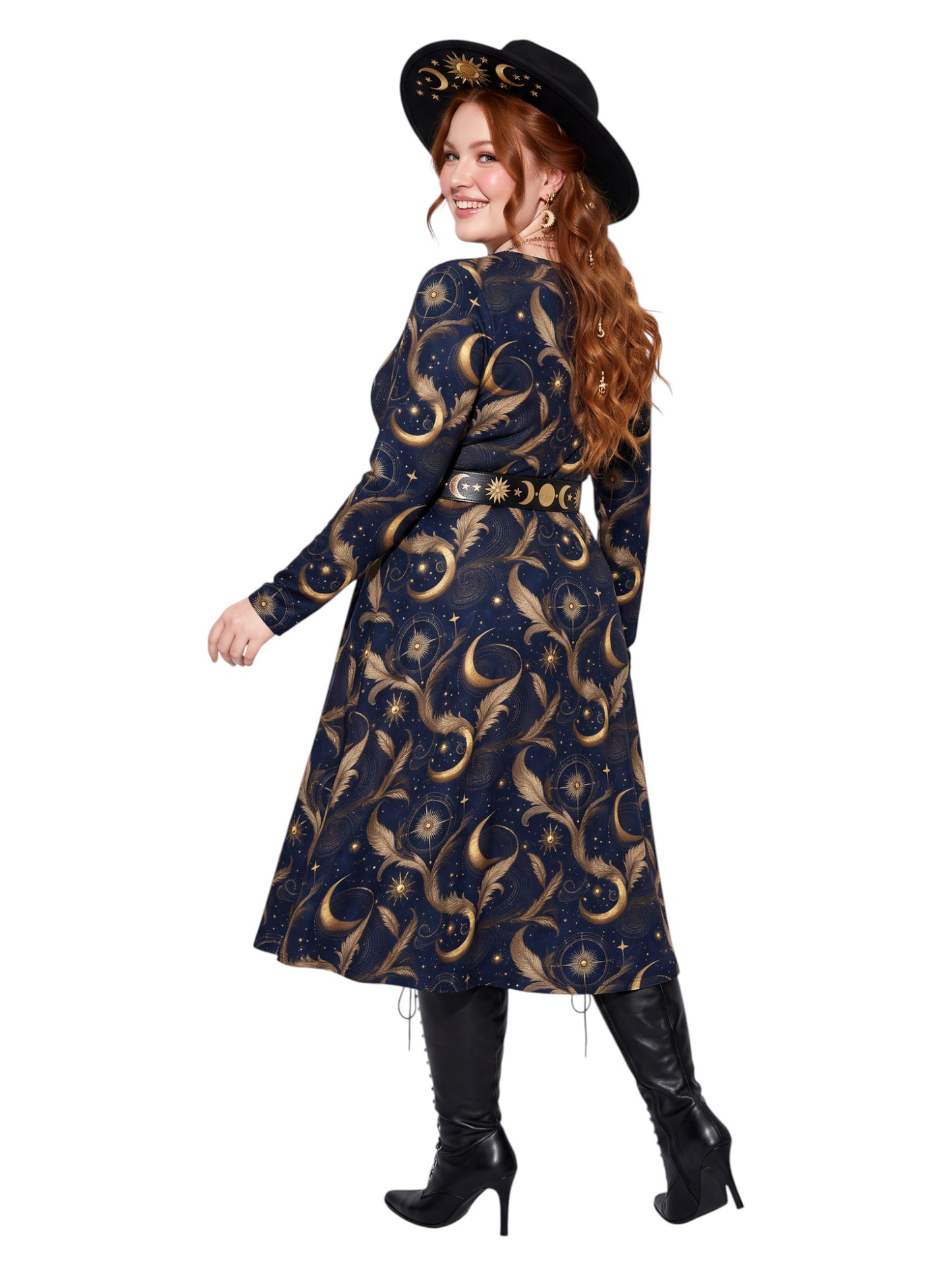 Plus size woman wearing a navy blue long sleeve fit and flare midi dress with side slit pockets featuring a gold sun, moon, and stars celestial print.