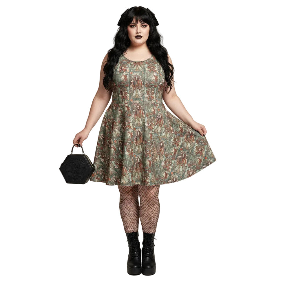 Plus size woman wearing a green Whimsigoth tarot card print skater dress with black fishnets and a gothic handbag.
