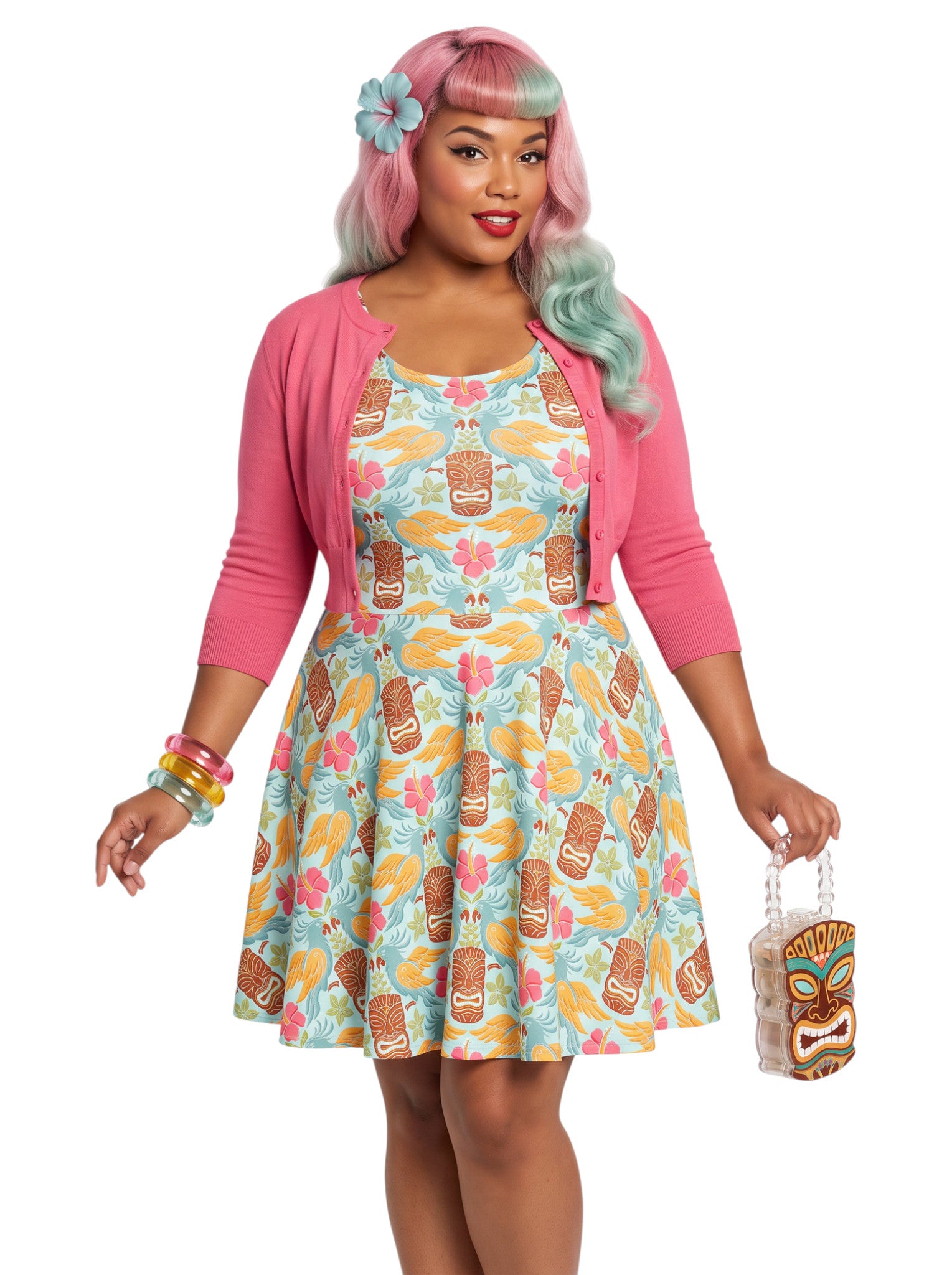 Plus-size woman in a tropical light blue Tiki mask and hibiscus flower print fit and flare swing dress highlighting a comfortable, inclusive curvy fit.