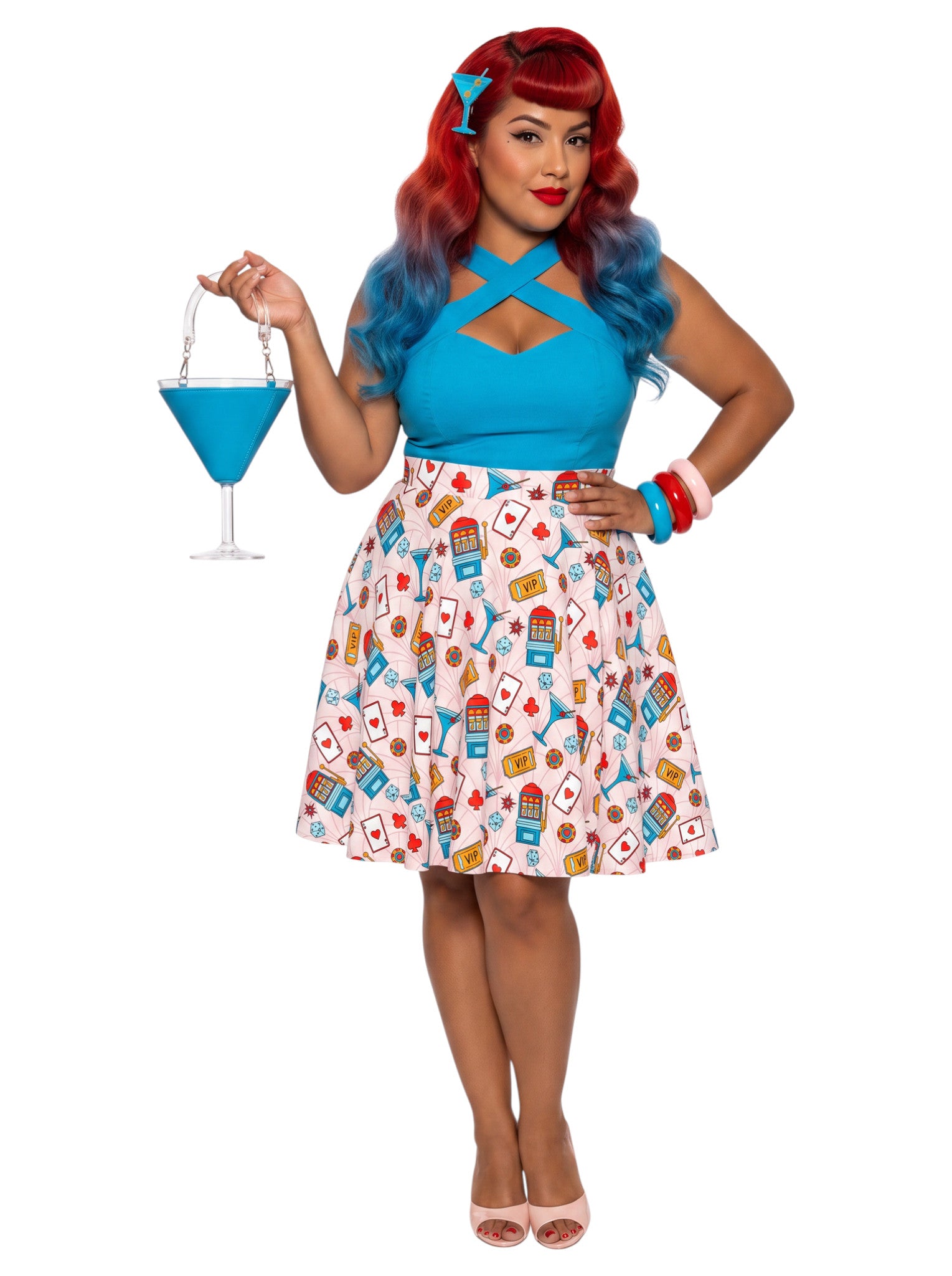 Woman wearing a plus size High-waisted retro Vegas pinup swing skirt with a colorful martini glass, dice, and slot machine print layout.