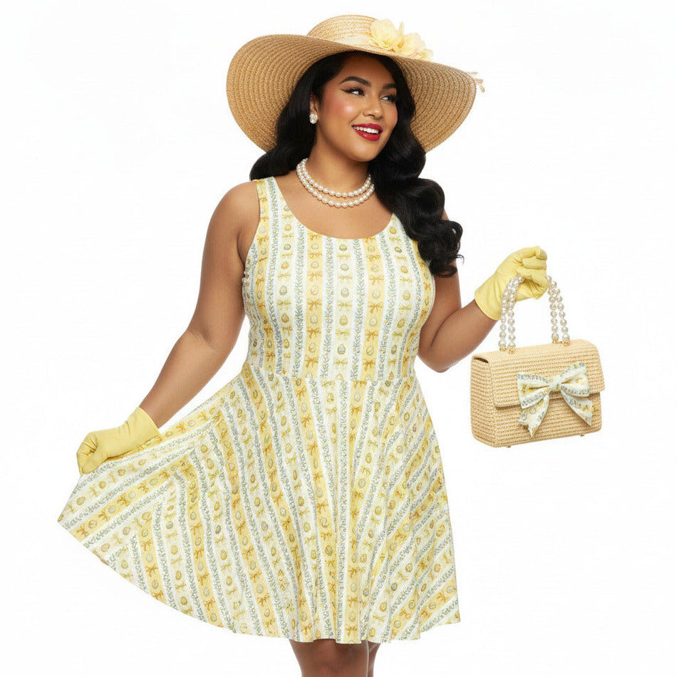 Plus size woman wearing a yellow 1950s vintage-inspired fit and flare dress with an Easter egg pattern, styled with a straw hat and pearls.