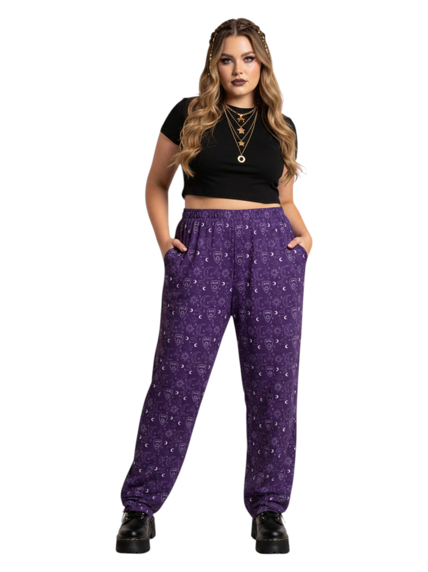 Woman wearing purple Whimsigoth wide leg lounge pants with celestial moon and sun print.