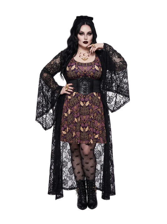 Plus size woman modeling a purple Whimsigoth gothic moth ghost skater dress with a fit and flare silhouette.