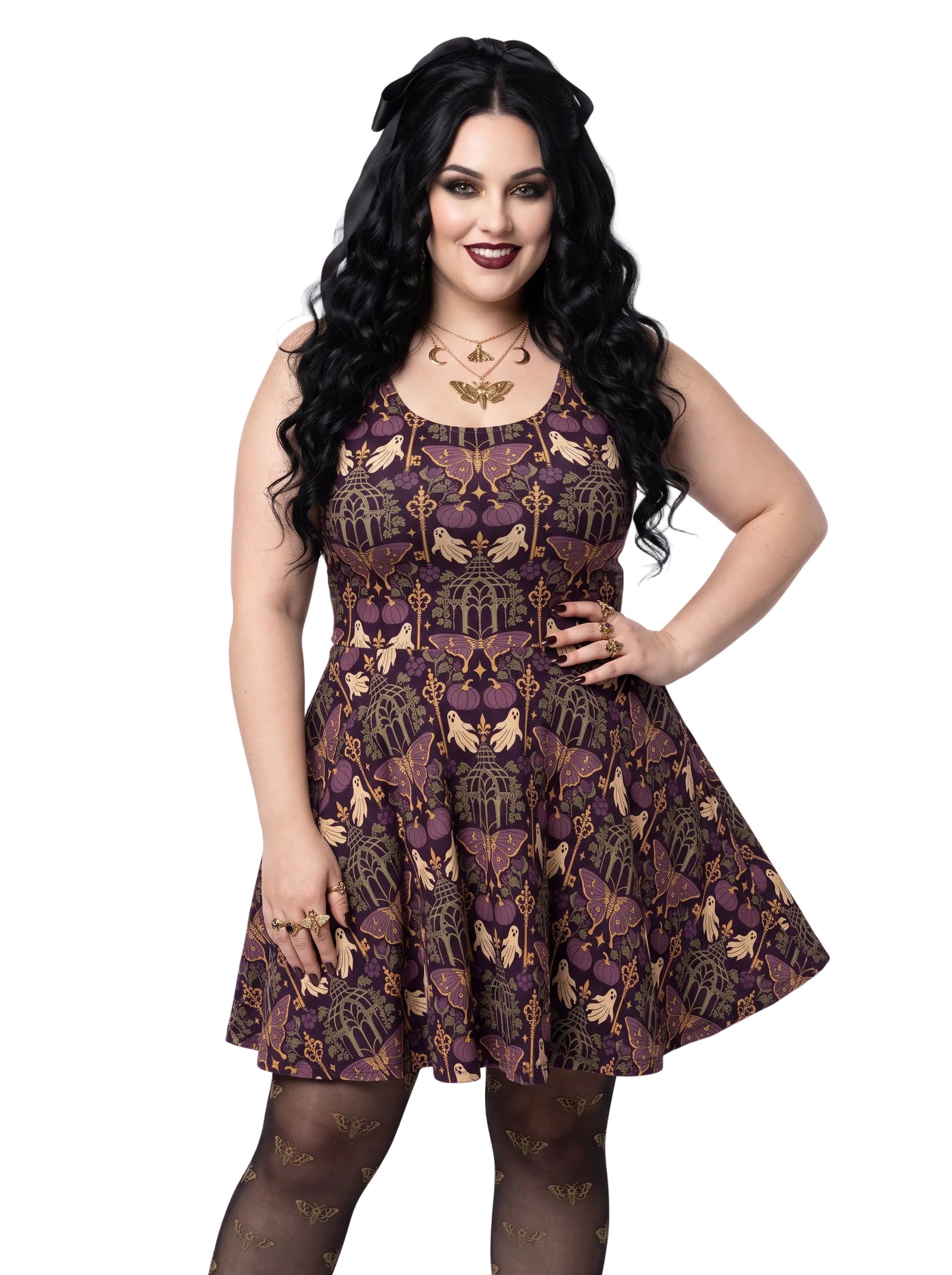 Plus size woman modeling a purple Whimsigoth gothic moth ghost skater dress with a fit and flare silhouette.