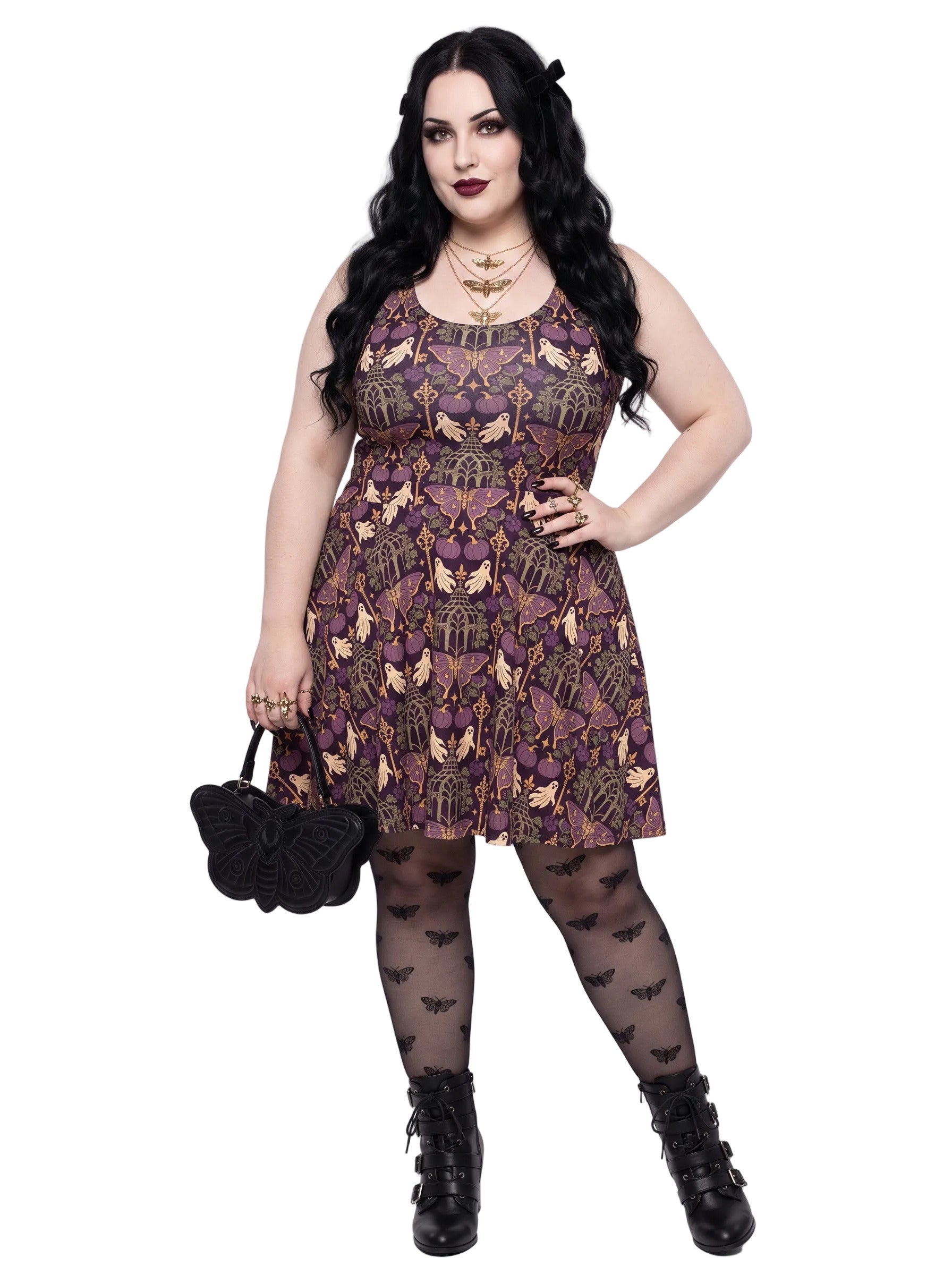 Plus size woman modeling a purple Whimsigoth gothic moth ghost skater dress with a fit and flare silhouette.