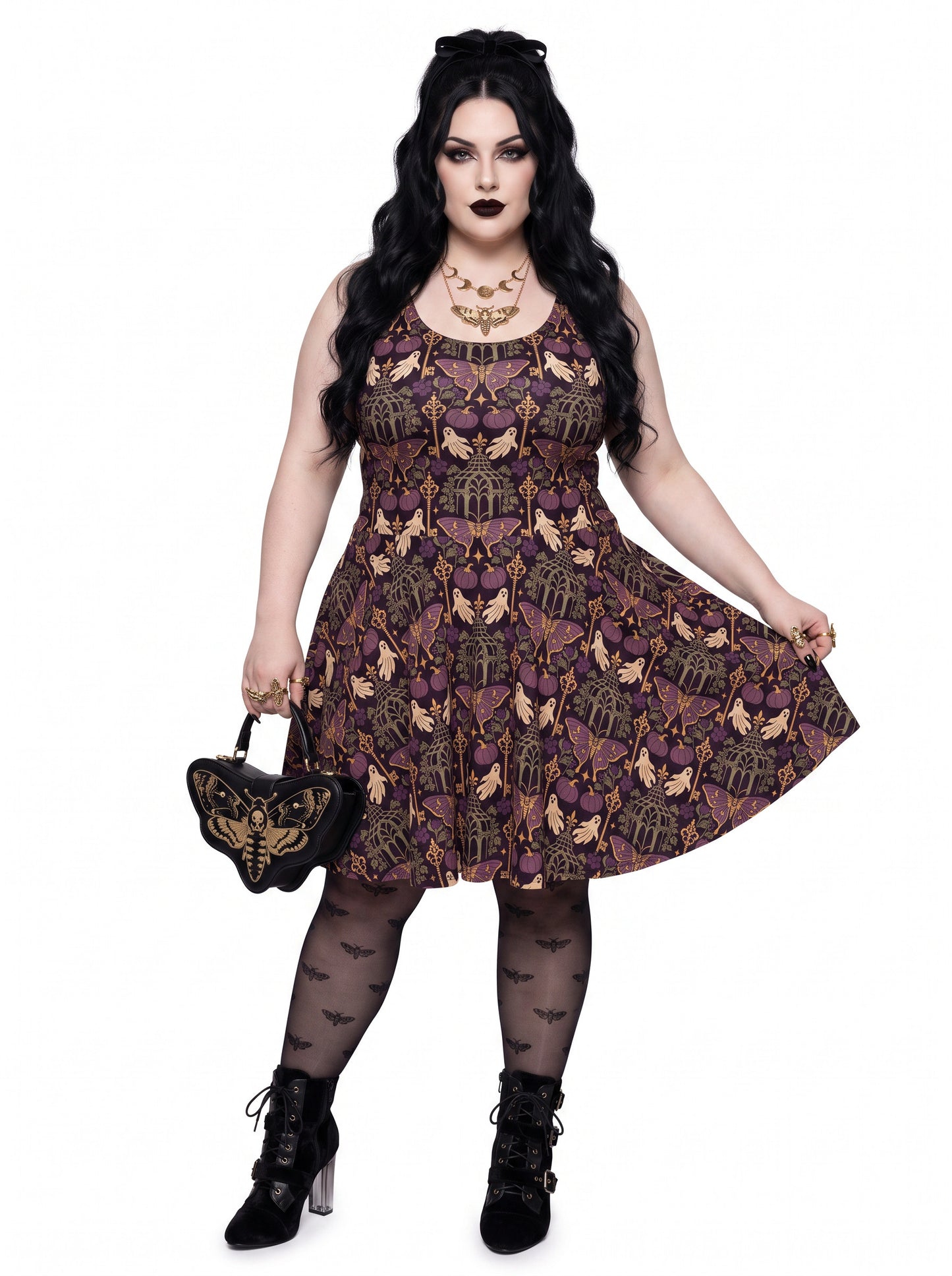 Plus size woman modeling a purple Whimsigoth gothic moth ghost skater dress with a fit and flare silhouette.