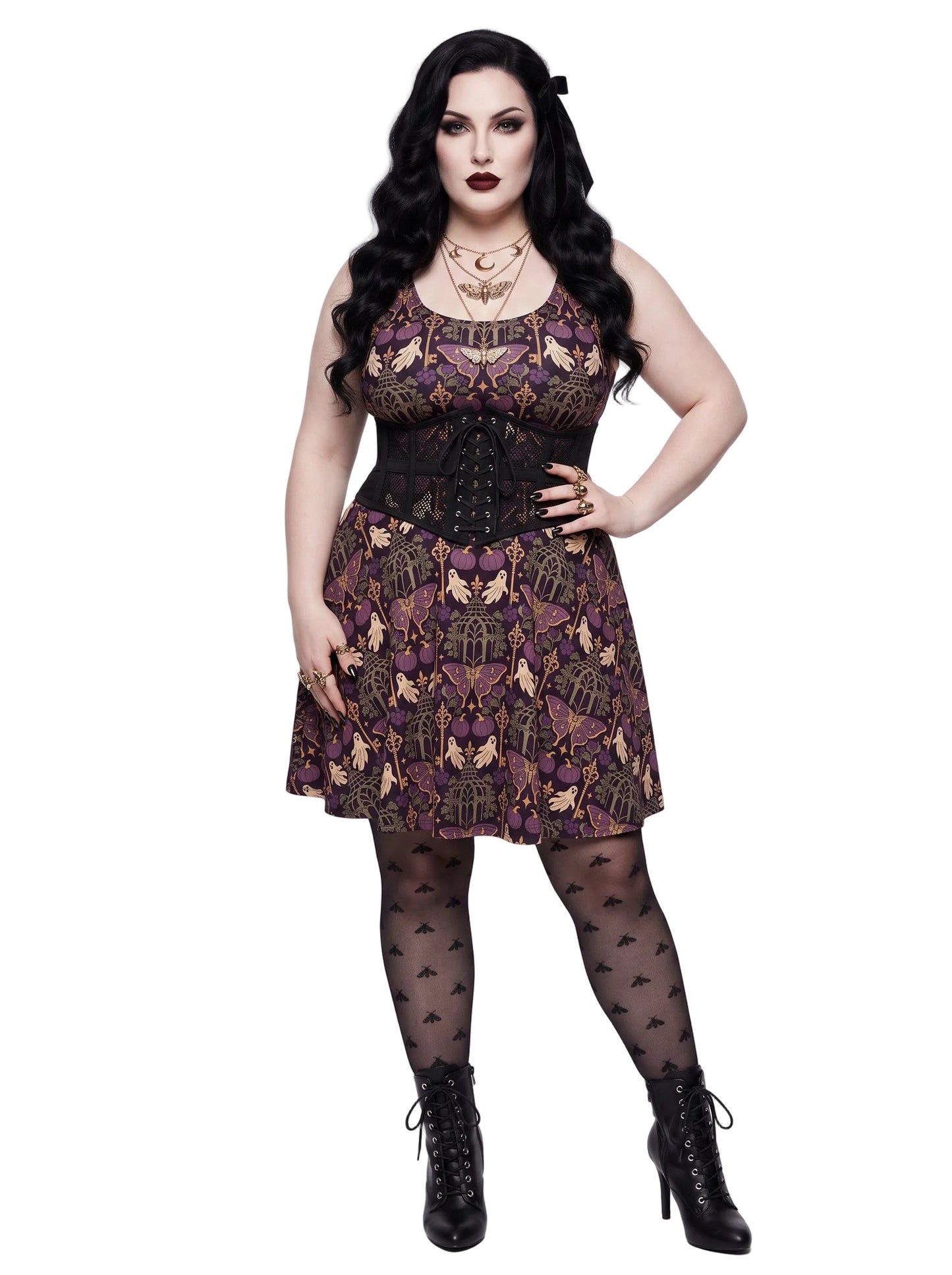 Plus size woman modeling a purple Whimsigoth gothic moth ghost skater dress with a fit and flare silhouette.