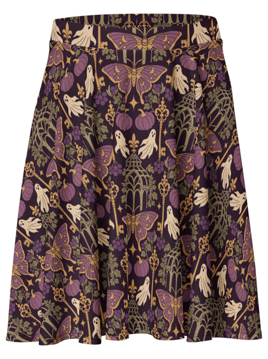 A whimsigoth flared skirt with a dense vintage-style Halloween print featuring purple moths, cream ghosts, purple pumpkins, and gold accents on a dark background.