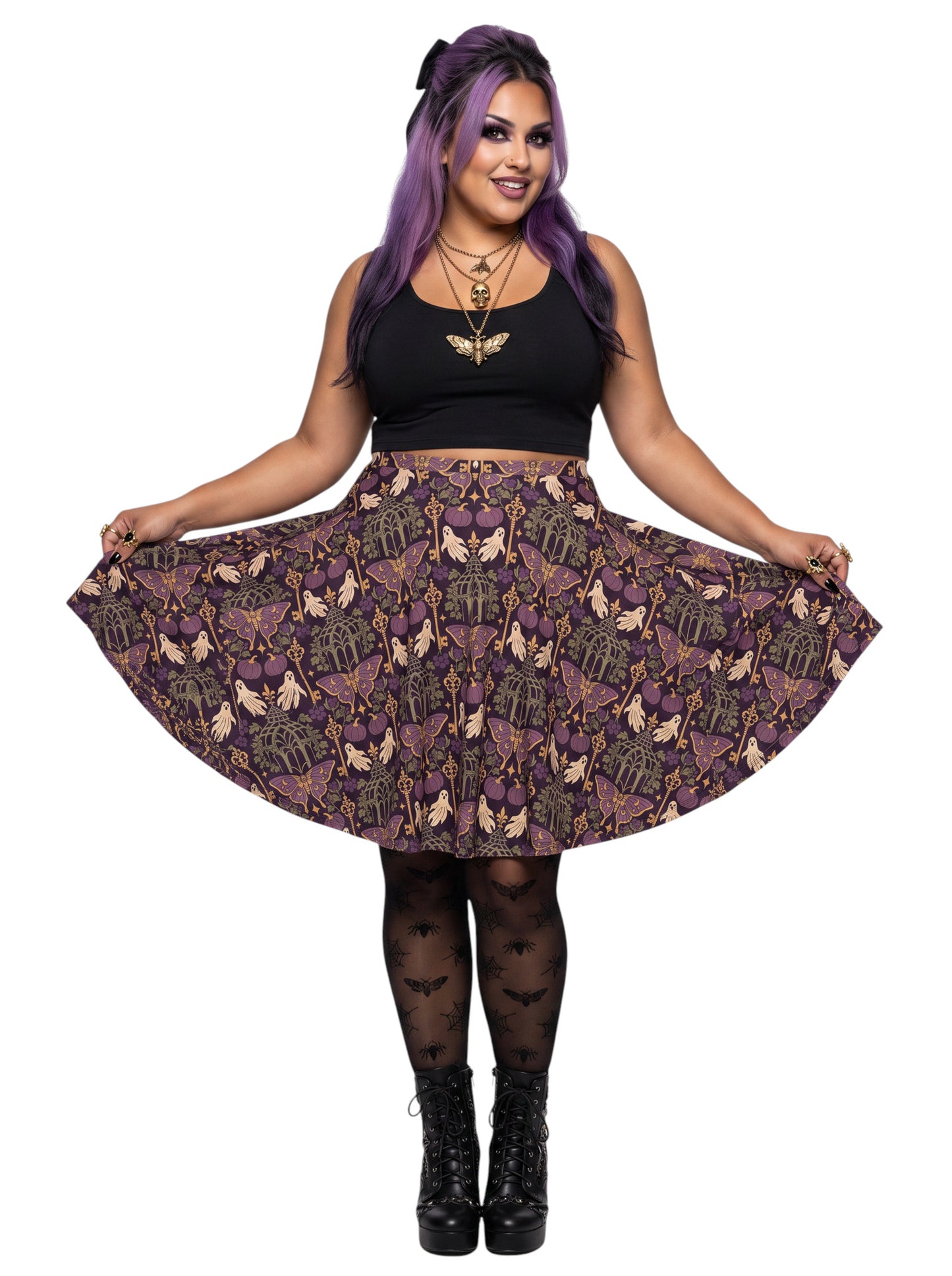 Woman wearing a purple Whimsigoth moth print goth flare skirt with black crop top and moth tights.