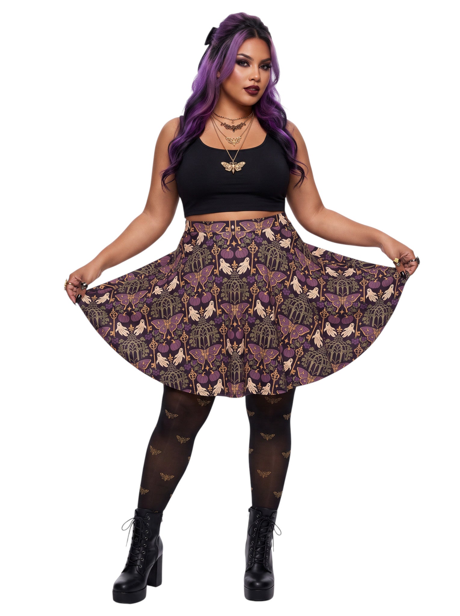 Woman wearing a purple Whimsigoth moth print goth flare skirt with black crop top and moth tights.
