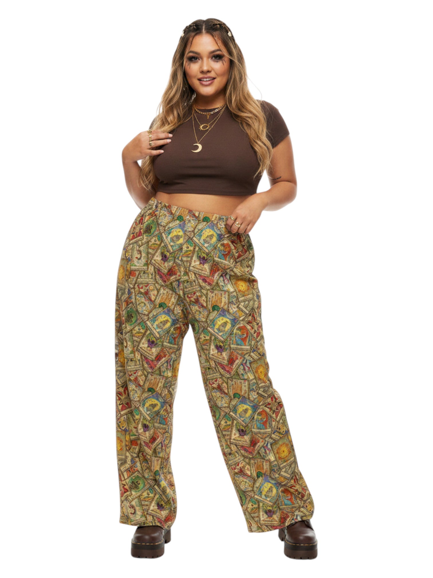 Woman wearing Whimsigoth wide leg lounge pants with vintage tarot card print and practical side pockets.