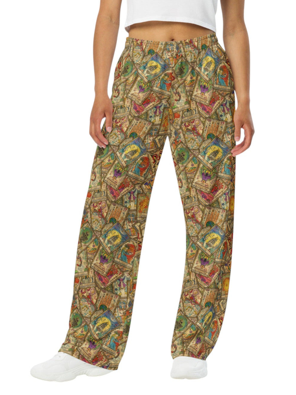 Woman wearing Whimsigoth wide leg lounge pants with vintage tarot card print and practical side pockets.
