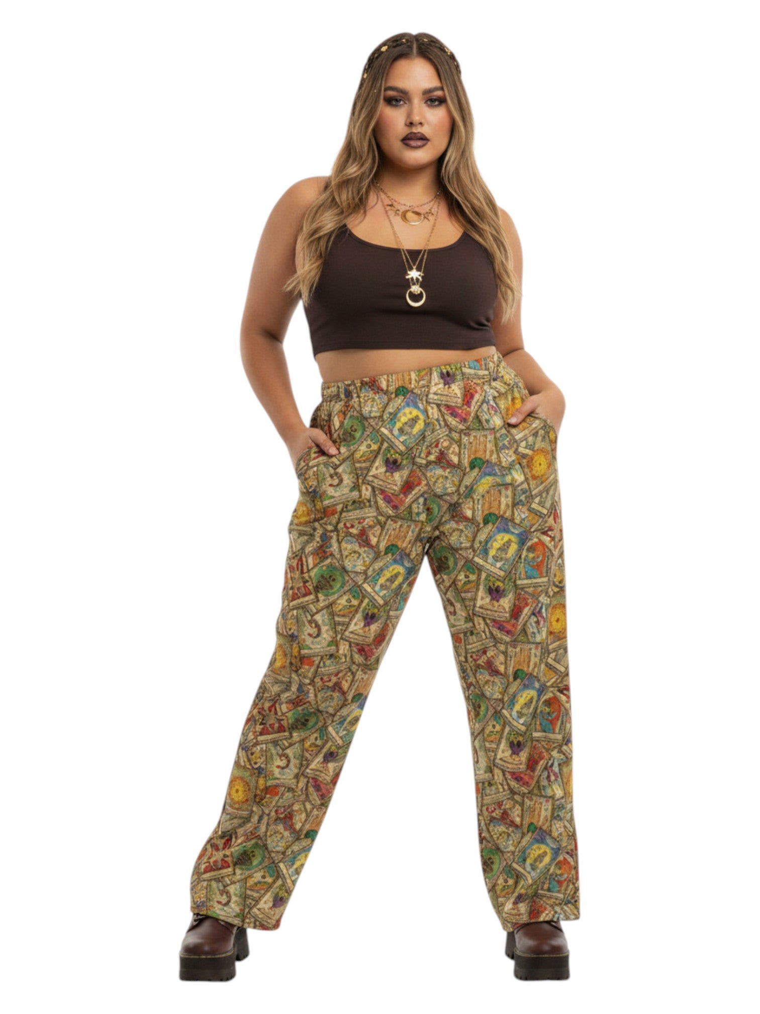 Woman wearing Whimsigoth wide leg lounge pants with vintage tarot card print and practical side pockets.
