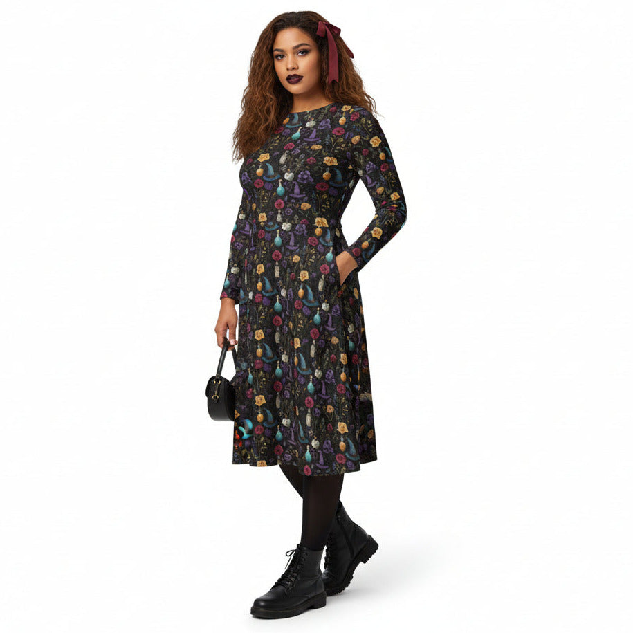 Woman wearing a long-sleeve, patterned dress on a white background