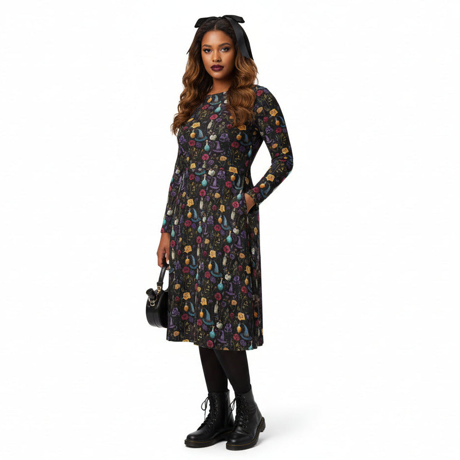 Woman wearing a patterned dress on a white background