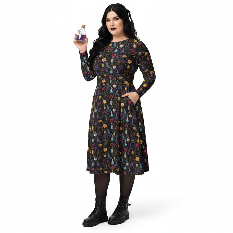 Woman wearing a patterned dress holding a bottle on a white background
