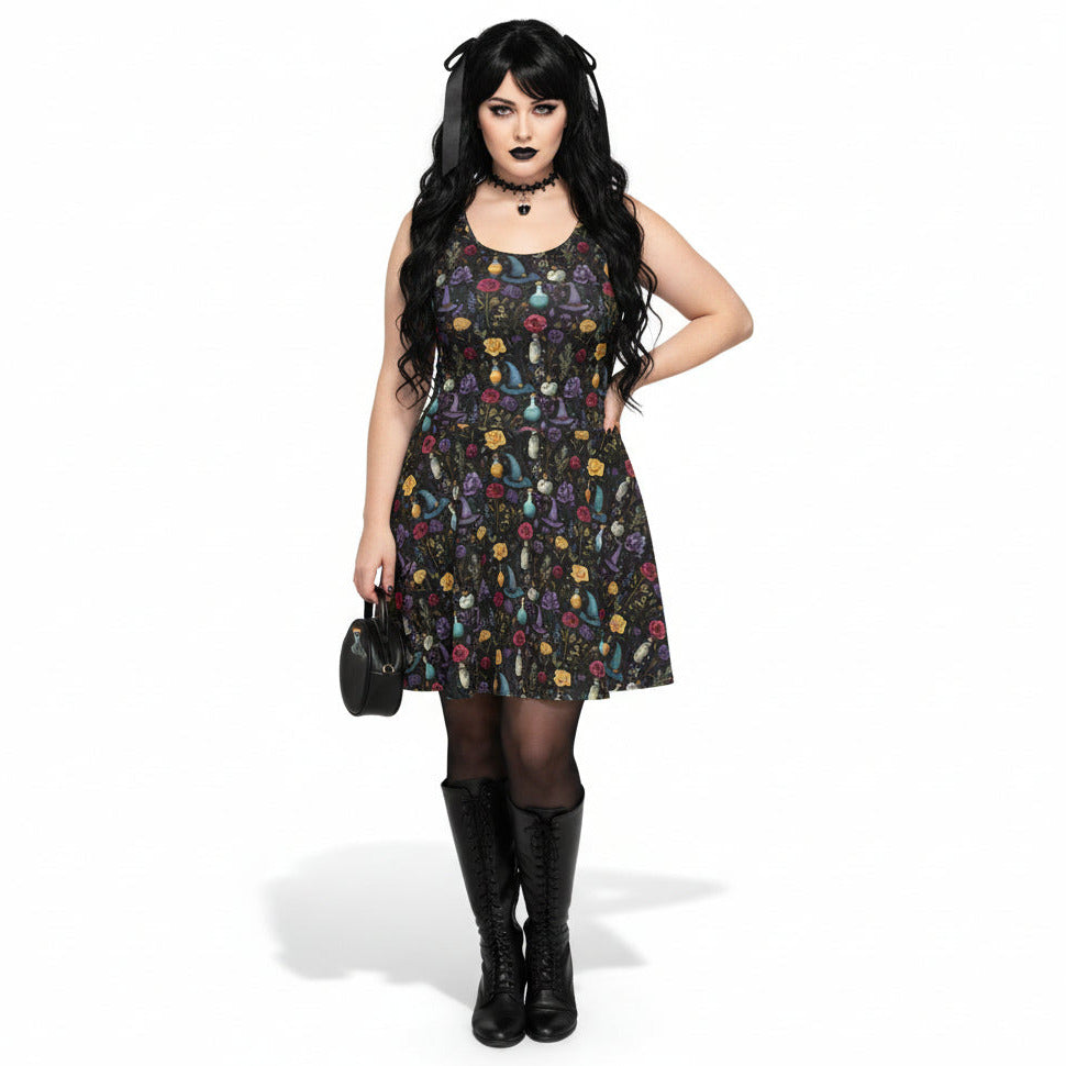 Woman wearing a patterned dress with black boots on a white background