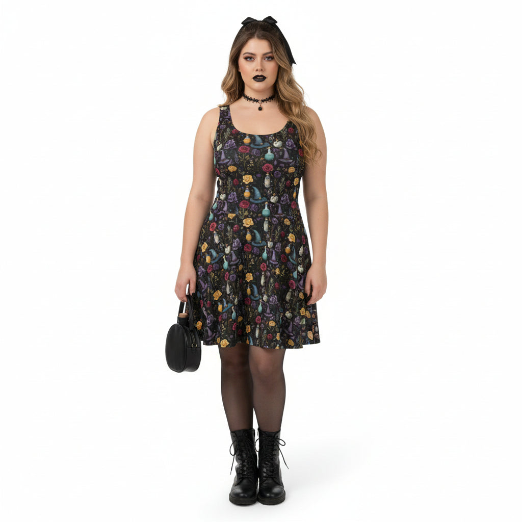 Woman wearing a black sleeveless dress with colorful floral pattern on a white background