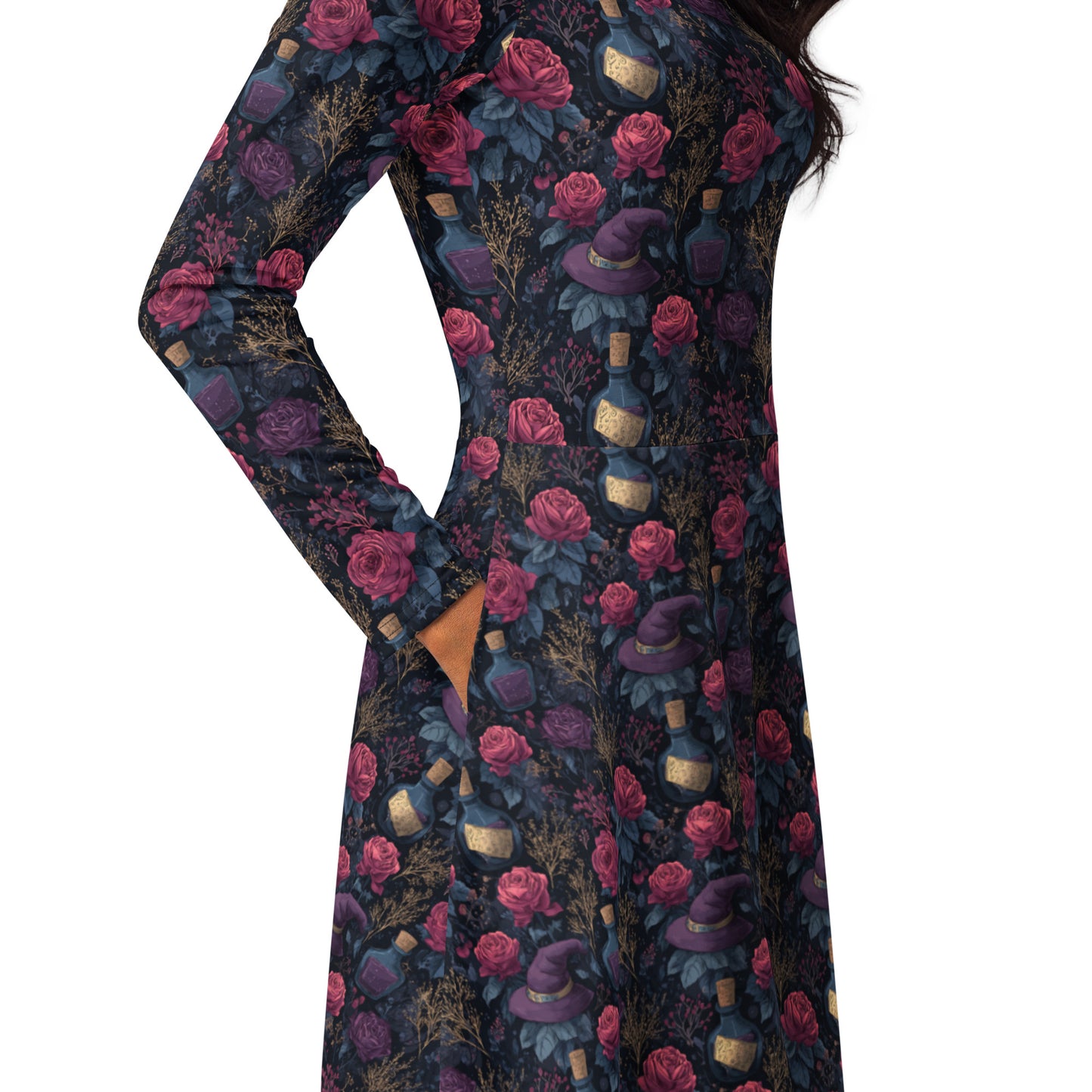 Long-sleeve dress with a floral and potion pattern on a white background