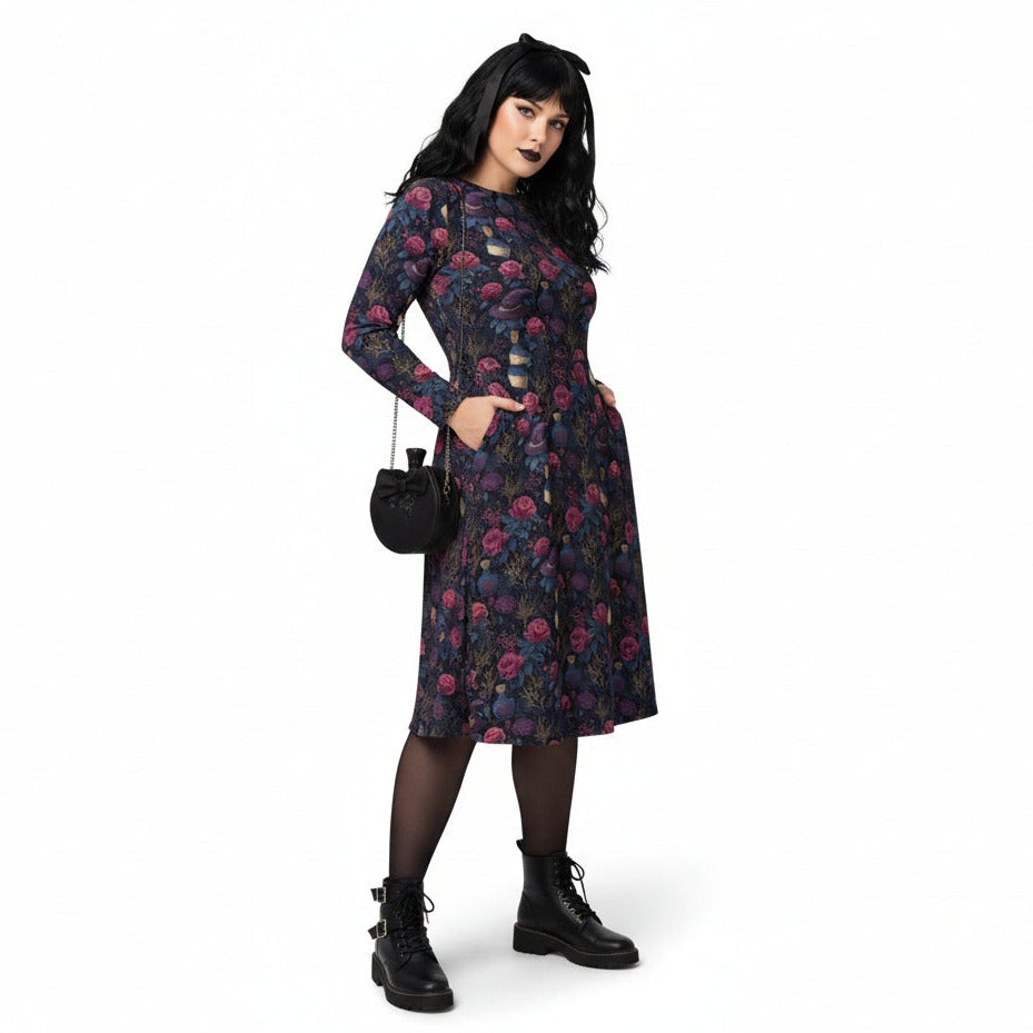 Woman wearing a floral dress with a black background