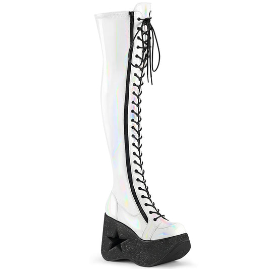 White holographic thigh-high platform boots with black laces and 5-inch star cutout wedge heel.