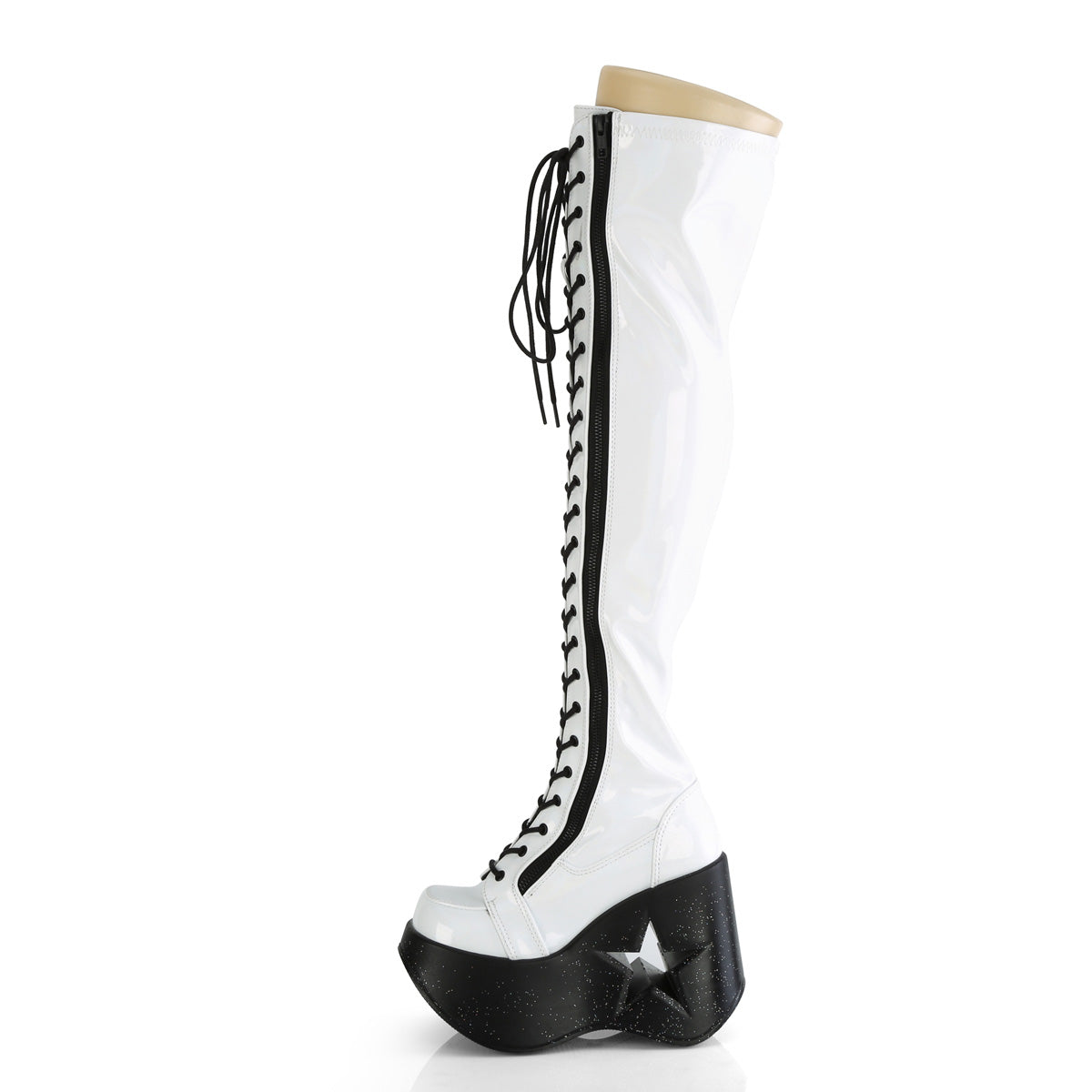 White holographic thigh-high platform boots with black laces and 5-inch star cutout wedge heel.
